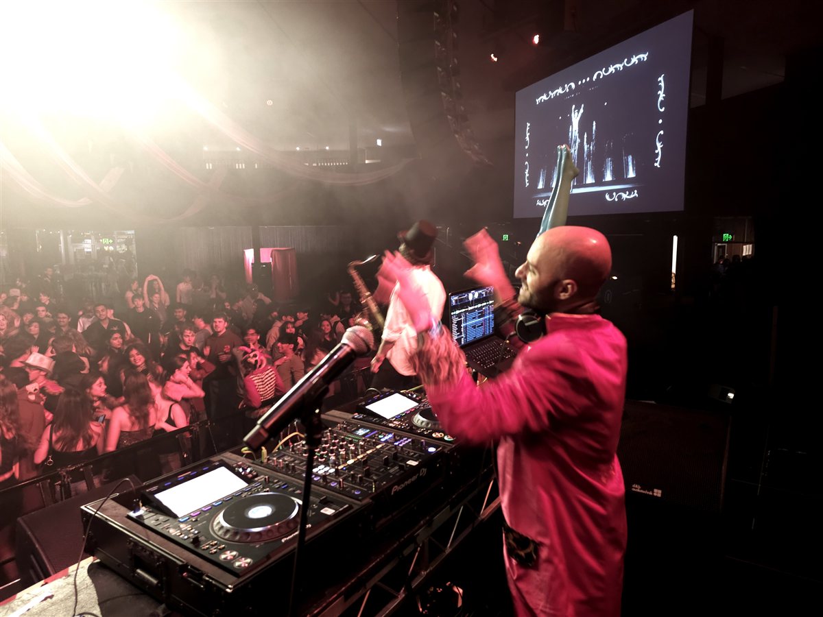Live music performance on stage with crowd energy